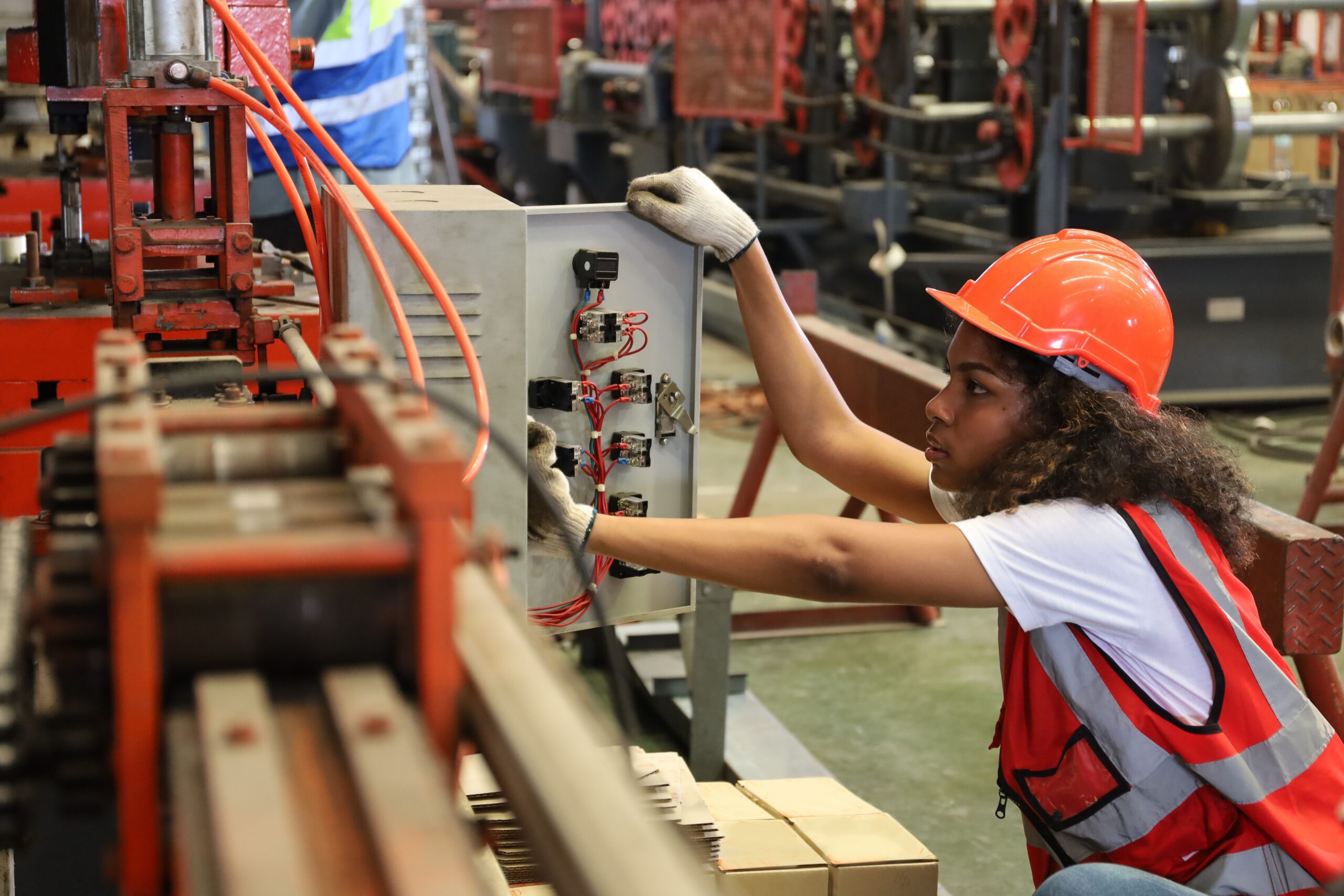 The,Young,Lady,Worker,Operate,Or,Repair,The,Electric,Circuit